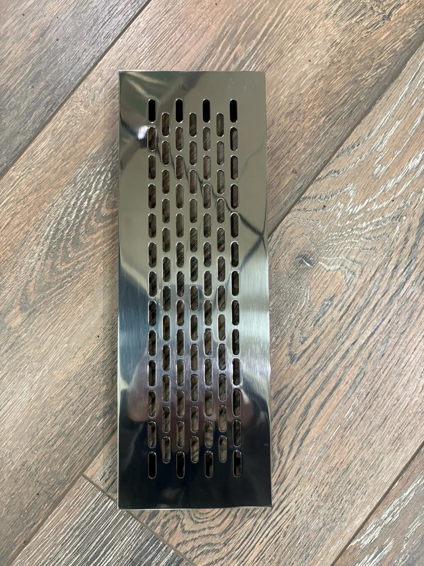 Вентиляционная решетка из полированной нержавеющей стали NR 10 300х100